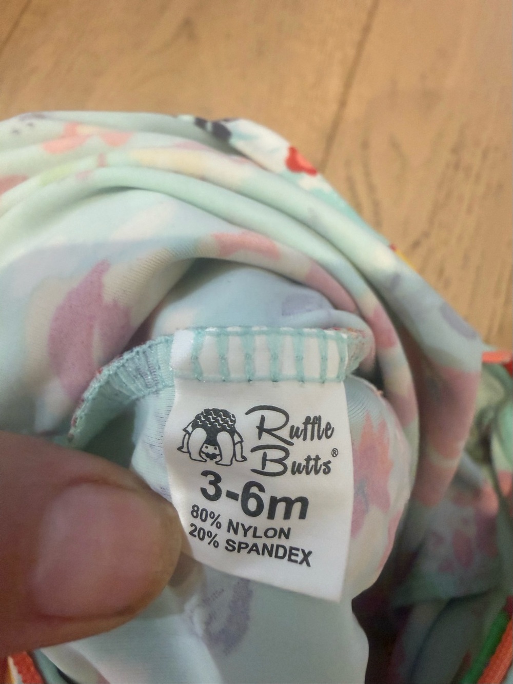 Ruffle Butts Light Blue Floral Long Sleeve Swim Suit with Pink & Yellow Flowers - Picture 12 of 12